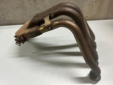 UN COLLECTEUR D ECHAPPEMENT