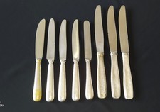 ENSEMBLE DE 5 COUTEAUX EN METAL ARGENTE DU PAQUEBOT "FRANCE" MONOGRAMMES CGT