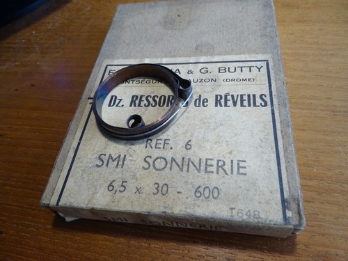 Horlogerie ressort reveil - un,