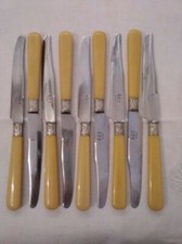 9 couteaux 20 cm Mitre métal
