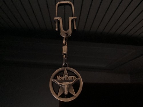 Magnifique rare porte cle - rare,