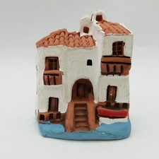 maison miniature en terre