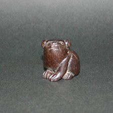 Era Netsuke dog wood sculpting