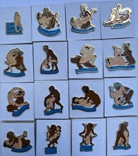 a 12 PINS PIN SEXY PIN-UP SERIE KAMASUTRA