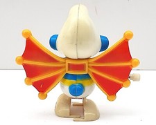 PEYO  SCHTROUMPF  JOUET MÉCANIQUE ANCIEN  AILES DE PAPILLON WINGSUIT FONCTIONNE