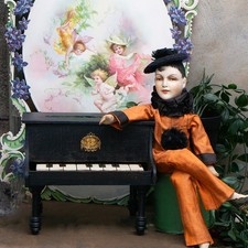 Piano jouet ancien en bois