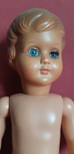 Ancienne poupée aux yeux bleus hauteur 45 cm rhodoïd ?