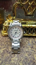 ancienne montre bracelet  vuillemin regnier a date  tachymetre a quartz