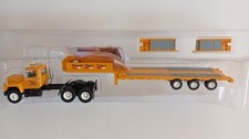 Camion semi MACK porte engin 1/43