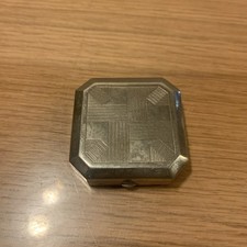 poudrier art déco Système