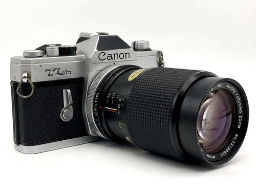 Canon vivitar - +,