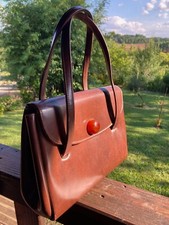 Sac à main vintage en skaï marron fermeture pression parfait état années 1950.