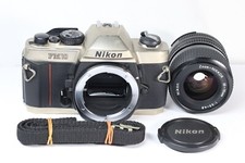 Appareil photo argentique Nikon FM10 SLR 35mm + Objectif Ai-S Zoom Nikkor 35-...