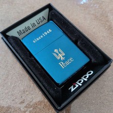 Briquet zippo Peace Blue Titanium inutilisé dans sa boîte garantie de 15 ans