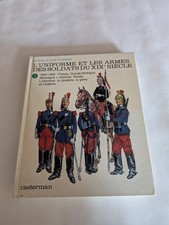 l'uniforme et les armes des