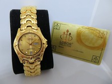 MONTRE LOBOR PLAQUÉE OR. avec