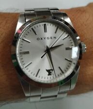 Montre Oxygène Quartz. Fonctionne Vintage. TBE. Tout Acier Water Résistant 5 ATM