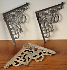 Rares trois équerres ART DÉCO en Fonte d'aluminium à décor de jeune homme dénudé