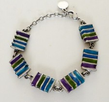 BRACELET EN METAL ARGENTE ET