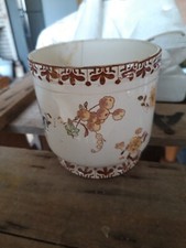Cache pot sur - , et