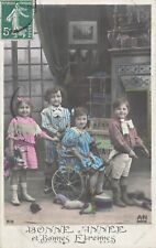 CP BONNES ETRENNES ENFANTS ELEGANTS CHAISE ROULANTE DANS SALON - 6414