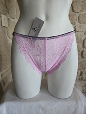 Tanga en dentelle rose neuf