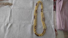 collier coquillages marrons et jaunes Longueur 64 cm