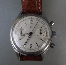 ancienne montre bracelet chronographe UTI boitier acier fonctionne