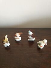 Lot de 4  fèves oiseaux en porcelaine