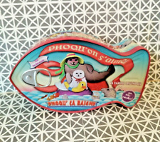 Boite métal vide en forme de poisson