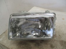 Phare gauche 7701034312 Renault 21