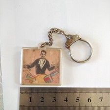 porte clé vintage lenticular VISIOMATIC VARI-VUE – musicien batteur