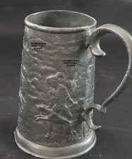 Tasse 19ème en étain chiens