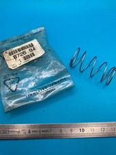 Ressort bouton de coffre