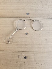 binocle face a main pliant