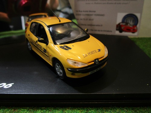 Peugeot 206 jaune poste au - ,