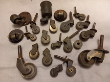 lot d'anciennes roulettes de meubles acier / /laiton