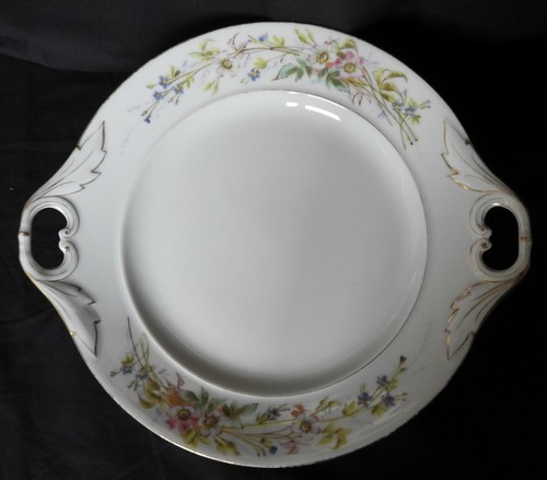 Assiette anses porcelaine - à,