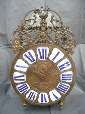 *HORLOGE CAPUCINE  BRONZE