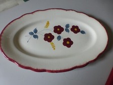 Plat ancien en faïence de