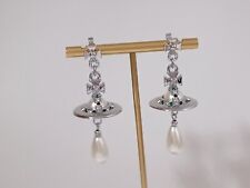 Vivienne Westwood- Boucles d'oreilles en plaqué argent, perles et planète.