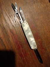 Ancien couteau manucure manche