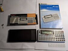 Sharp 1450 calculatrice pocket