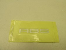 Emblème gauche garde boue