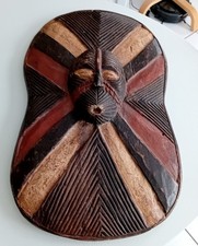 Bouclier masque africain vintage sculpté à la main ancien décor d'art mural