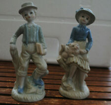 2 STATUE EN CERAMIQUE  FILLE AU CHAT GARCON AUX LIVRES OBJET DE VITRINE