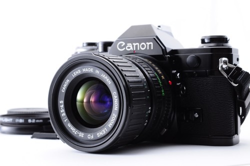 Objectif canon zoom - /,