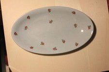 Petit plat en faïence de Longwy vert pale