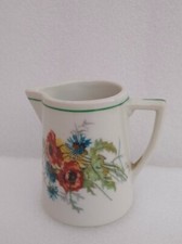 ancien petit pichet à lait en porcelaine à décor à décor de fleur pavot bleu 