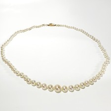 Vintage pearl necklace with 18k gold security chain and clasp